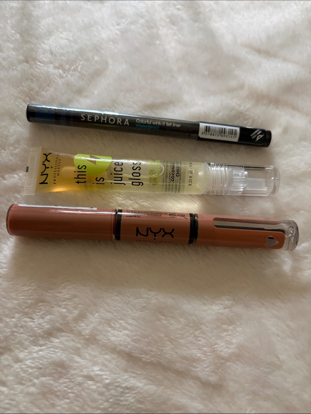 Sephora Black Felt Tip Eyeliner with NYX Clear Gloss and Warm Brown Lip Tint